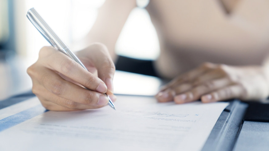 woman-filling-out-paperwork
