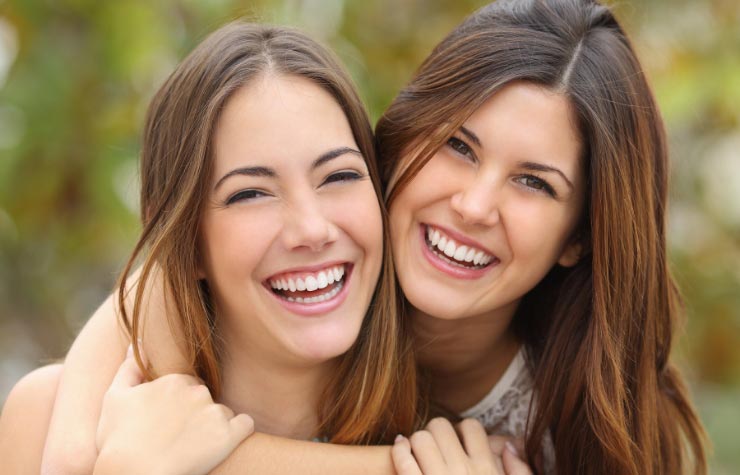 two-young-women-smiling
